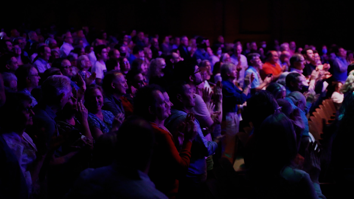 An audience enjoying R.E.M. Explored in March 2023.