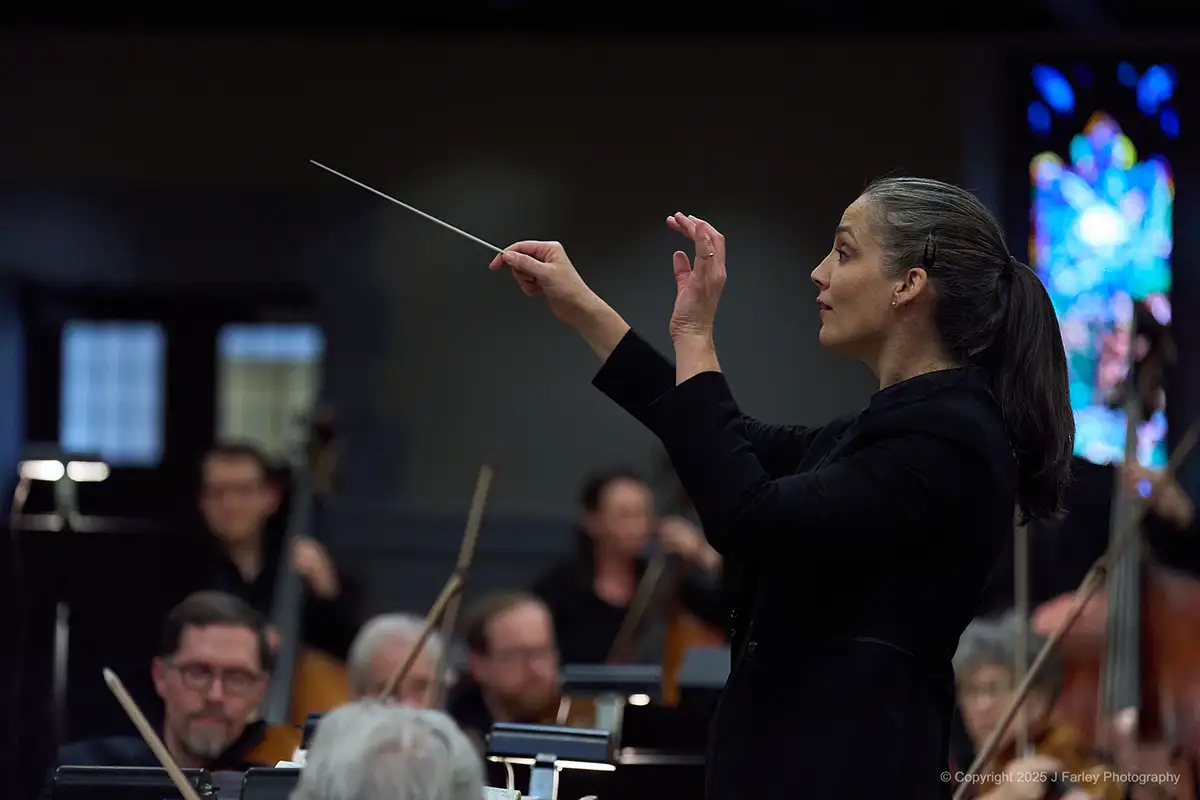 Michelle Merrill conducts